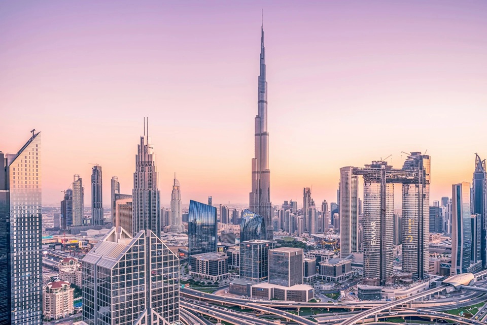 Your new beginning awaits A stunning view of the Dubai skyline at sunset, representing new opportunities.